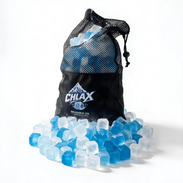 A black mesh drawstring bag with the CHLAX logo, filled with translucent blue and clear ice cubes, with more ice spilled around the base on a white studio background.