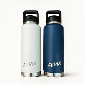 Two insulated water bottles with black handles and lids, standing side by side on a white background. The bottle on the left is white with a silver logo, and the bottle on the right is dark blue with a silver logo.