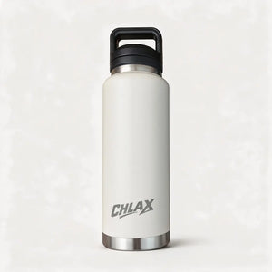 A matte off-white insulated water bottle with a black carrying loop lid and a silver metal base, featuring the CHLAX logo printed in gray. #driftwood