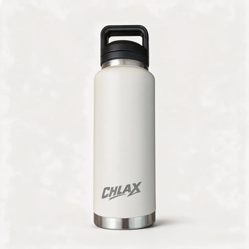 A matte off-white insulated water bottle with a black carrying loop lid and a silver metal base, featuring the CHLAX logo printed in gray. #driftwood