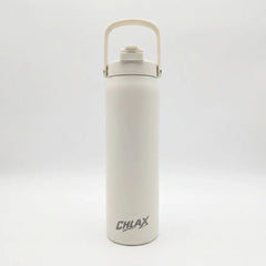 A tall, cylindrical insulated water bottle in a warm off-white or cream color, featuring a matching cream carrying loop lid and a dark gray 'CHLAX' logo near the bottom. The bottle is photographed against a seamless, light gray studio background.