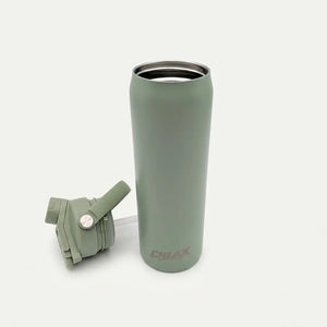 A matte sage green insulated travel tumbler with a matching flip-straw lid placed beside it on a clean, light off-white background. The brand name 'CHLAX' is printed near the bottom of the tumbler.