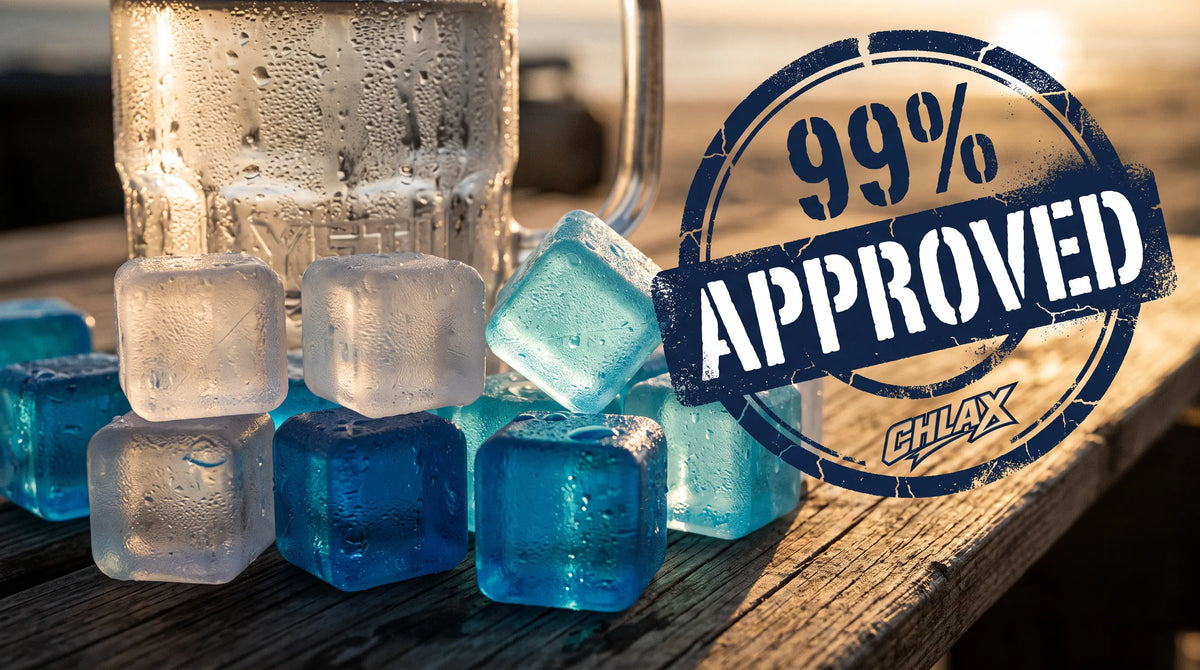 A close-up of a glass mug with condensation sitting on a wooden surface beside several translucent ice cubes, with a large dark blue stamp reading '99% APPROVED' and 'CHLAX' overlaid on the right.