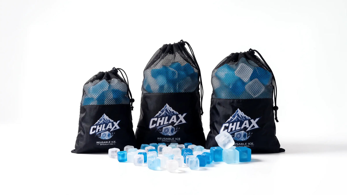 Three black drawstring bags filled with blue and clear reusable ice cubes, arranged on a white studio background. The center bag has a visible CHLAX logo, and loose ice cubes are scattered in front.