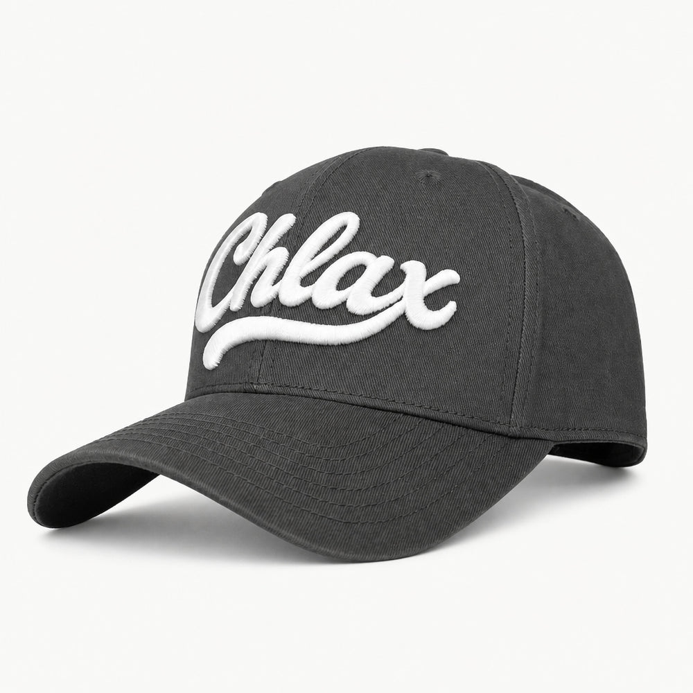 A dark gray baseball cap featuring the word 'Chlax' embroidered in white script across the front, set against a clean white background.