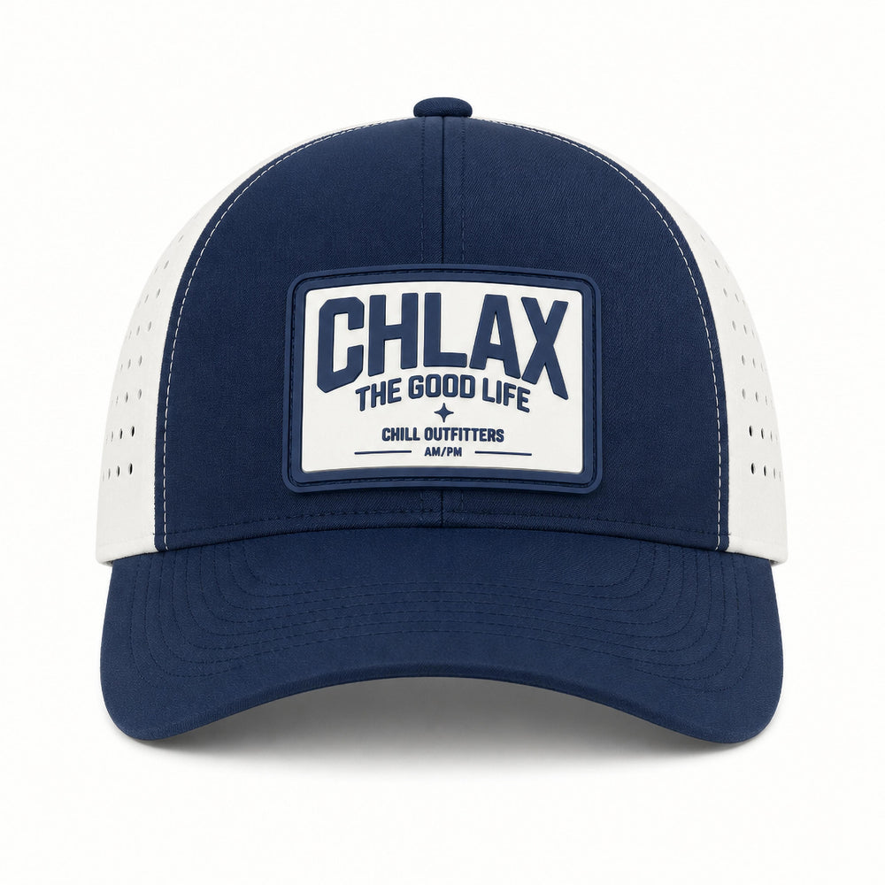 A navy blue and white trucker-style baseball cap with a white rectangular patch on the front that reads 'CHLAX THE GOOD LIFE' and 'CHILL OUTFITTERS'.