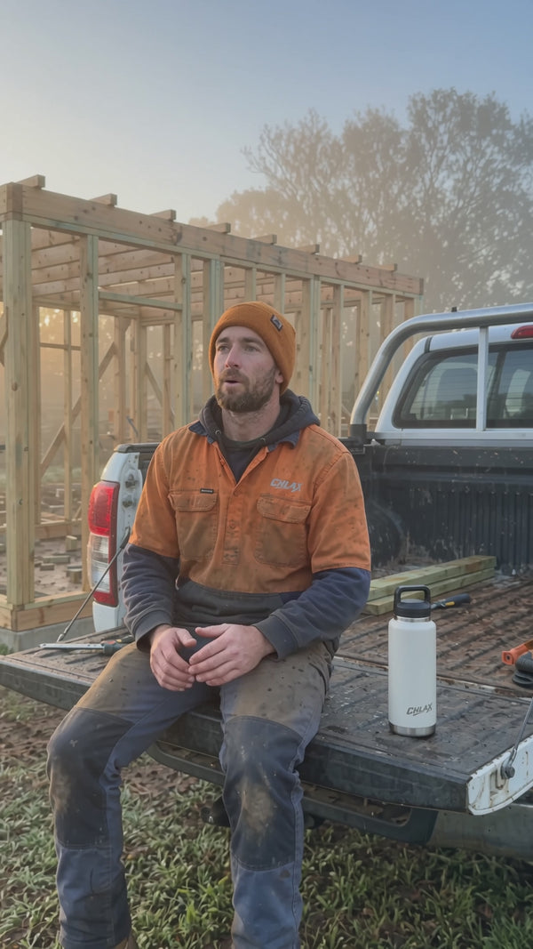 CHLAX insulated drink flask bottle in driftwood white with an Australian trades man sitting on the tailgate of a vehicle in high-vis clothing at a construction site video.
